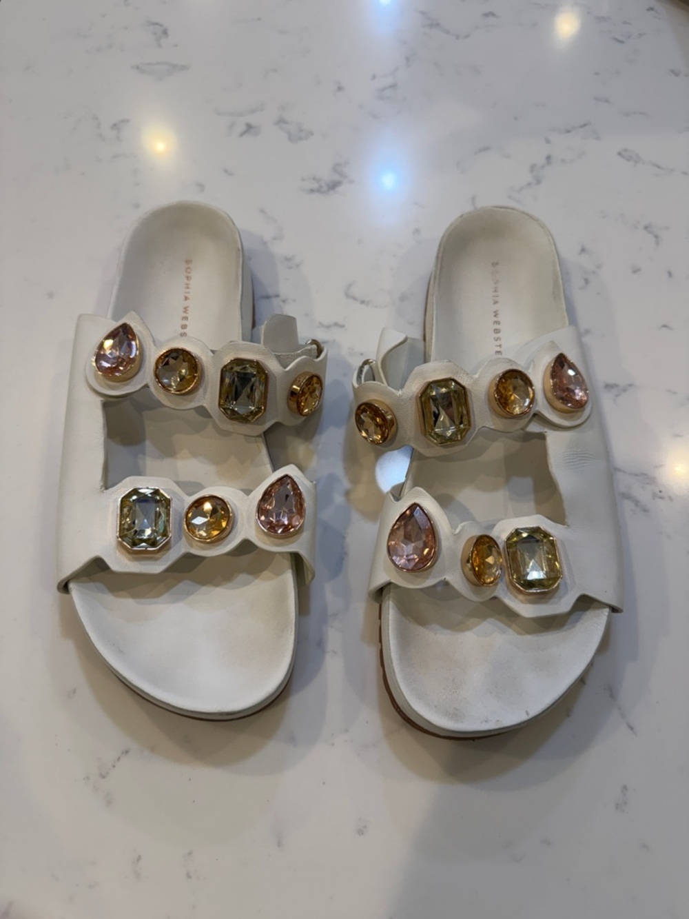 Sophia Webster White Slide Sandals with Pink and Gold Gem Accents